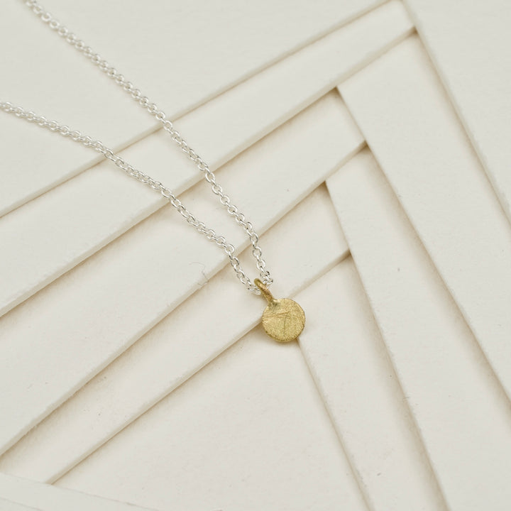 Anhänger 750 Gold mit Silberkette